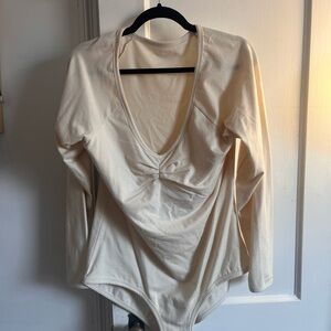 ARQ Cream Long Sleeve Bodysuit